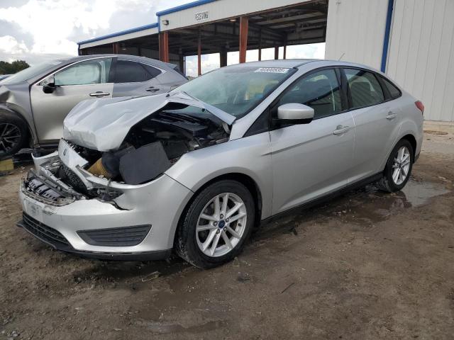 FORD FOCUS SE 2018 with VIN 1FADP3F29JL233999 - Photo from auction