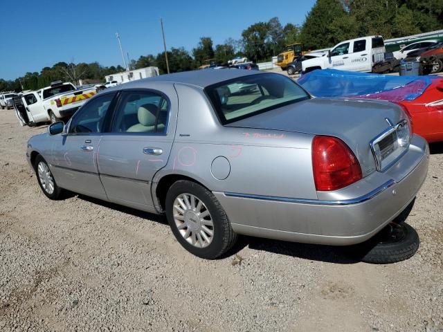 Photo 2 from auction – 2004 LINCOLN TOWN CAR E with VIN 1LNHM81W54Y632830