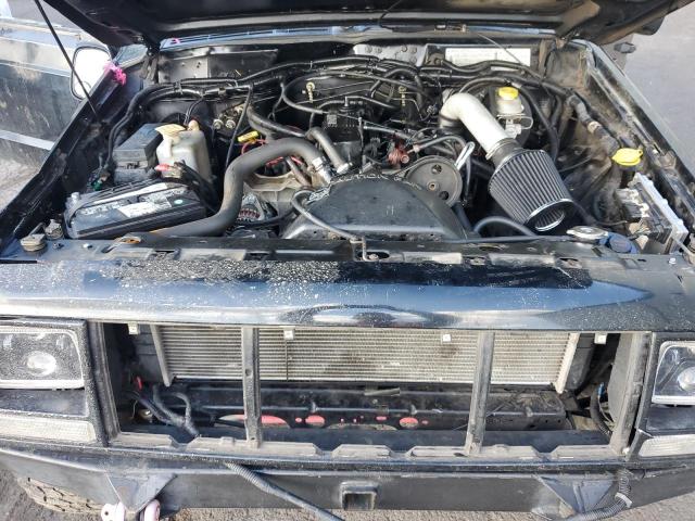 Photo 11 from auction – 1999 JEEP CHEROKEE with VIN 1J4FT28P3XL595475