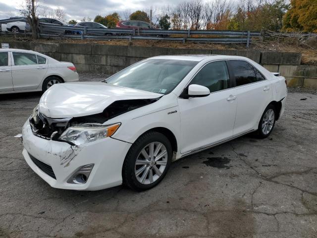 TOYOTA CAMRY HYBR 2012 with VIN 4T1BD1FK9CU056295 - Photo from auction