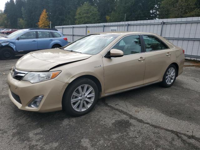 TOYOTA CAMRY HYBR 2012 with VIN 4T1BD1FK7CU036899 - Photo from auction