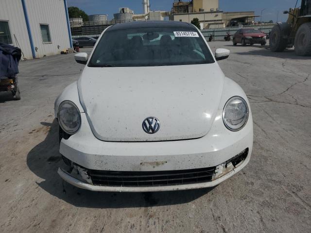 Photo 5 from auction – 2016 VOLKSWAGEN BEETLE with VIN 3VWJ07AT5GM627920