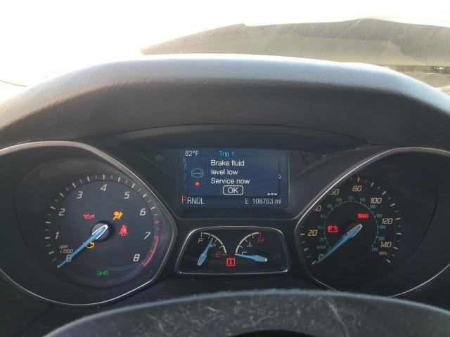 Photo 9 from auction – 2014 FORD FOCUS with VIN 1FADP3K23EL172578