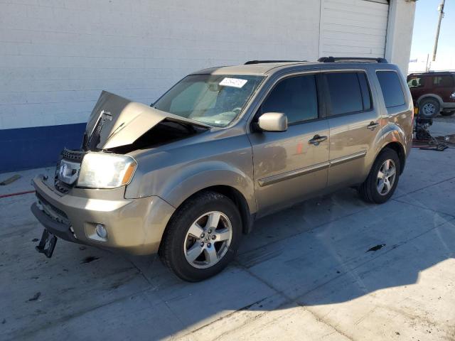 HONDA PILOT EXL 2011 with VIN 5FNYF4H57BB062380 - Photo from auction