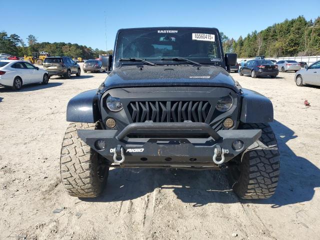 Photo 5 from auction – 2016 JEEP WRANGLER U with VIN 1C4BJWEG0GL103944