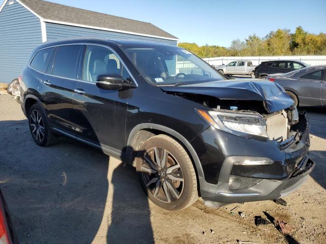 Photo 4 from auction – 2021 HONDA PILOT ELIT with VIN 5FNYF6H08MB045039