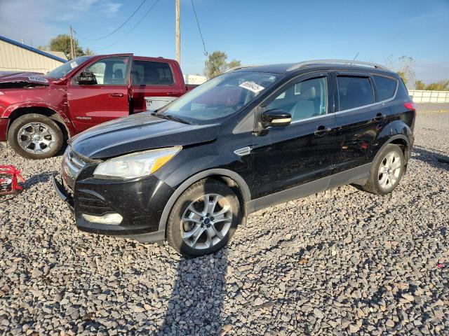 FORD ESCAPE TIT 2016 with VIN 1FMCU9J96GUA36583 - Photo from auction