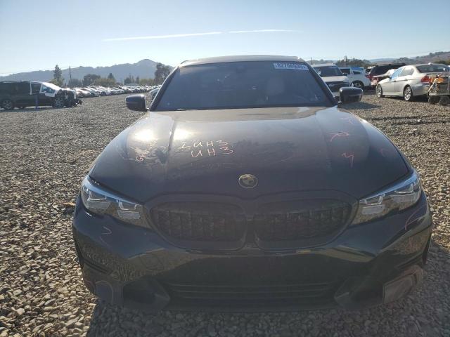 Photo 5 from auction – 2019 BMW 330I with VIN WBA5R1C55KFH17146
