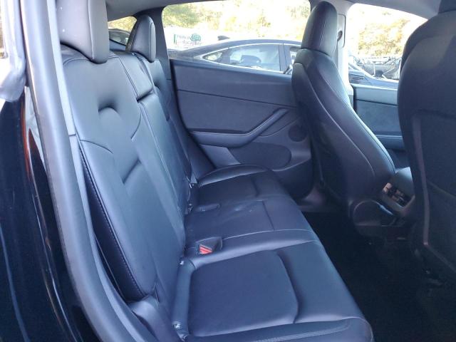Photo 11 from auction – 2022 TESLA MODEL Y with VIN 7SAYGDEF2NF346498