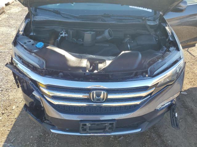 Photo 11 from auction – 2018 HONDA PILOT TOUR with VIN 5FNYF6H91JB005668