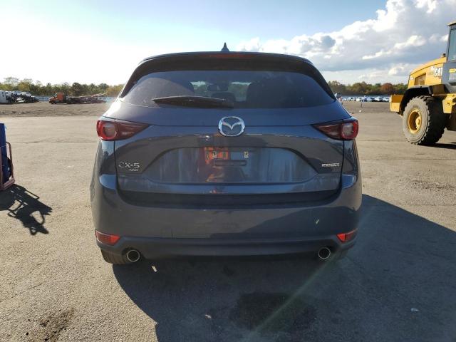Photo 6 from auction – 2021 MAZDA CX-5 TOURI with VIN JM3KFBCM1M0346752