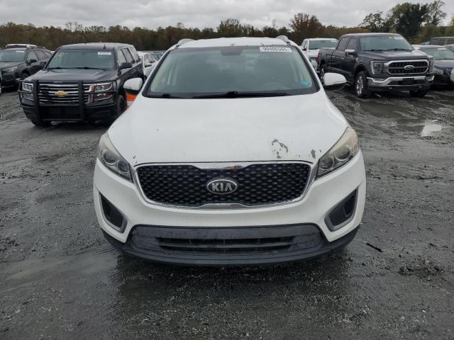 Photo 5 from auction – 2016 KIA SORENTO LX with VIN 5XYPG4A35GG134033