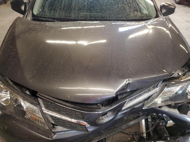 Photo 12 from auction – 2014 TOYOTA RAV4 LE with VIN JTMZFREV4EJ002852