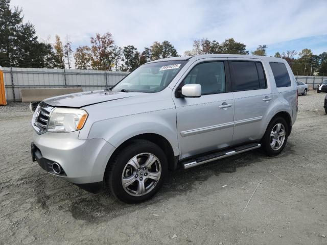 HONDA PILOT 2012 with VIN 5FNYF3H5XCB019597 - Photo from auction