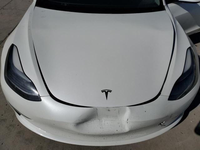 Photo 11 from auction – 2021 TESLA MODEL 3 with VIN 5YJ3E1EC7MF001211
