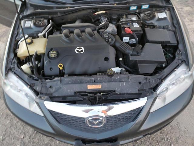 Photo 11 from auction – 2003 MAZDA 6 S with VIN 1YVFP80D235M53884