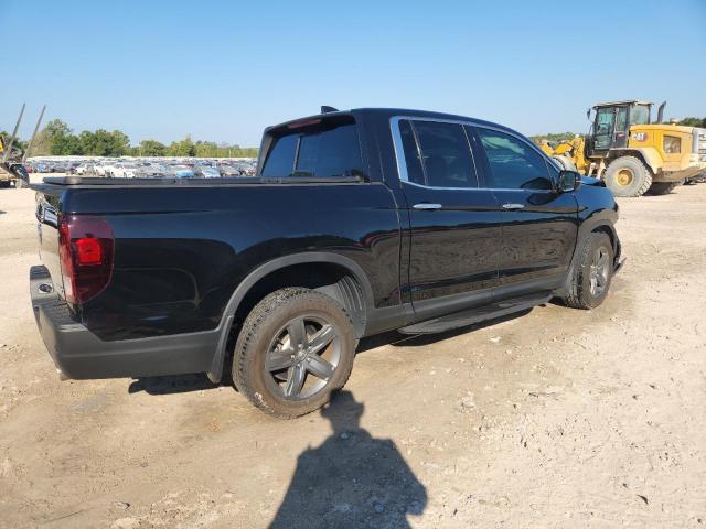 Photo 3 from auction – 2023 HONDA RIDGELINE with VIN 5FPYK3F74PB063172