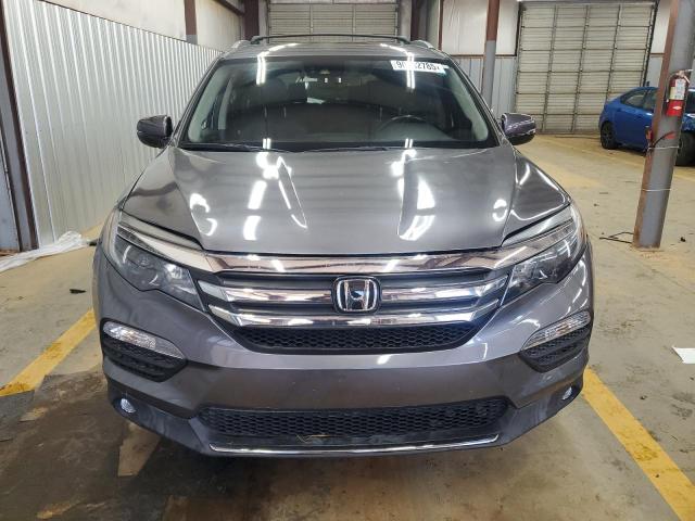 Photo 5 from auction – 2018 HONDA PILOT ELIT with VIN 5FNYF6H01JB032046