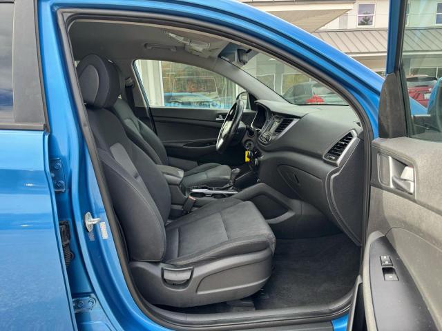 Photo 5 from auction – 2016 HYUNDAI TUCSON SE with VIN KM8J23A40GU097085