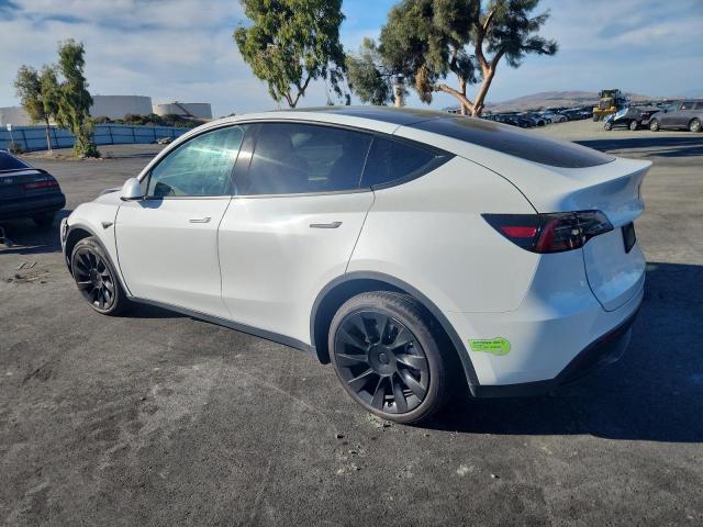 Photo 2 from auction – 2023 TESLA MODEL Y with VIN 7SAYGDEE9PF585900