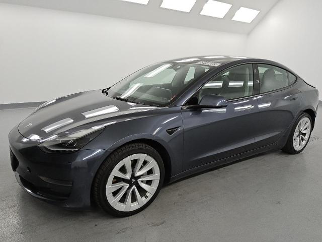TESLA MODEL 3 2022 with VIN 5YJ3E1EA6NF369699 - Photo from auction