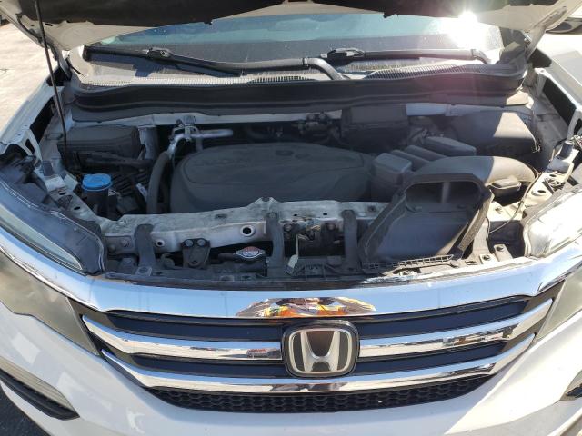 Photo 12 from auction – 2018 HONDA PILOT TOUR with VIN 5FNYF5H99JB008909