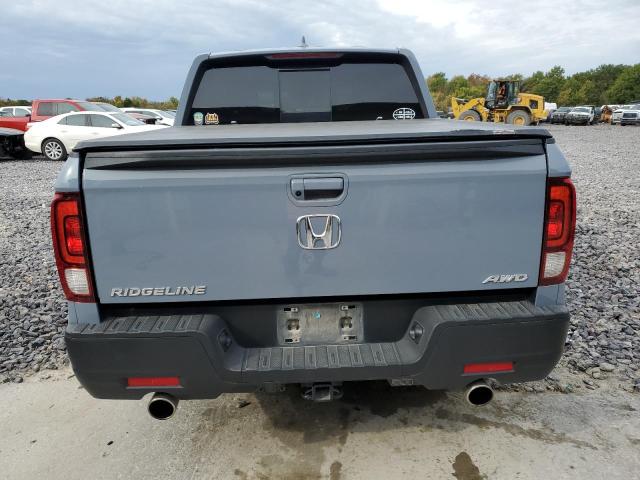 Photo 6 from auction – 2022 HONDA RIDGELINE with VIN 5FPYK3F58NB030624