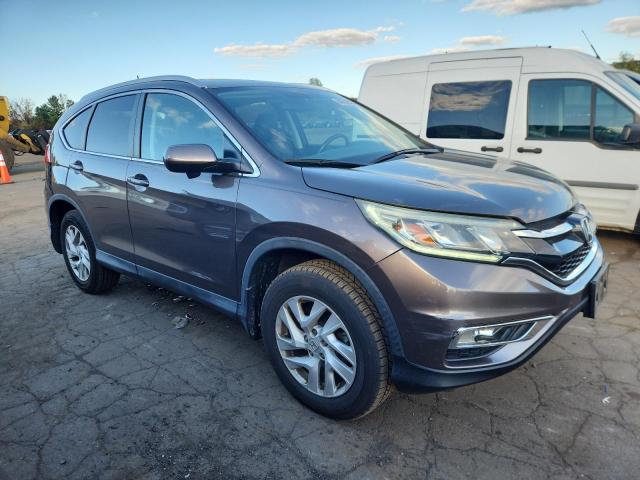 Photo 4 from auction – 2015 HONDA CR-V EXL with VIN 2HKRM4H77FH706639