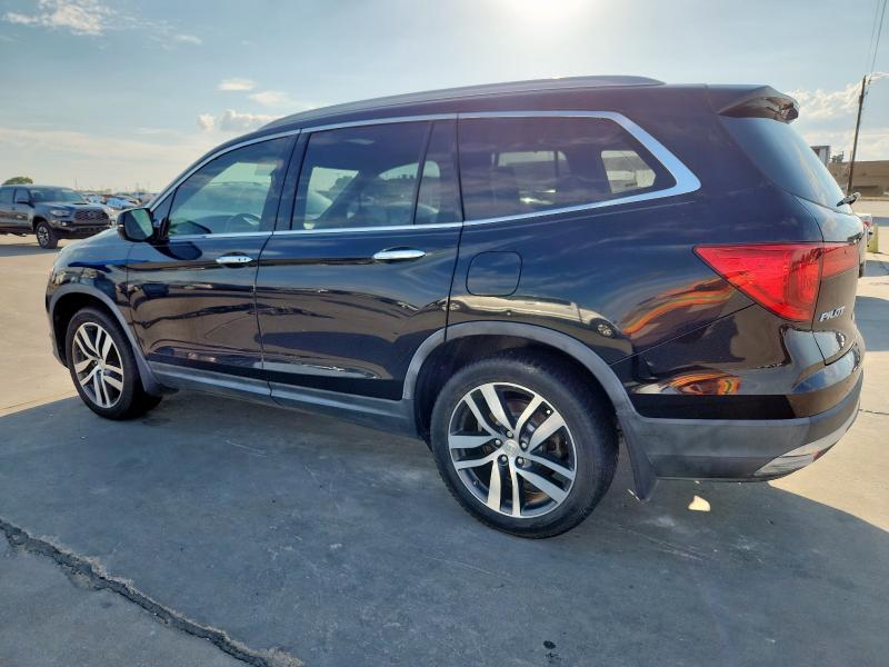 Photo 2 from auction – 2016 HONDA PILOT TOUR with VIN 5FNYF5H94GB003318