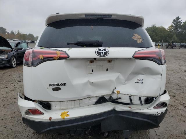 Photo 6 from auction – 2018 TOYOTA RAV4 LE with VIN JTMBFREV0JJ244646