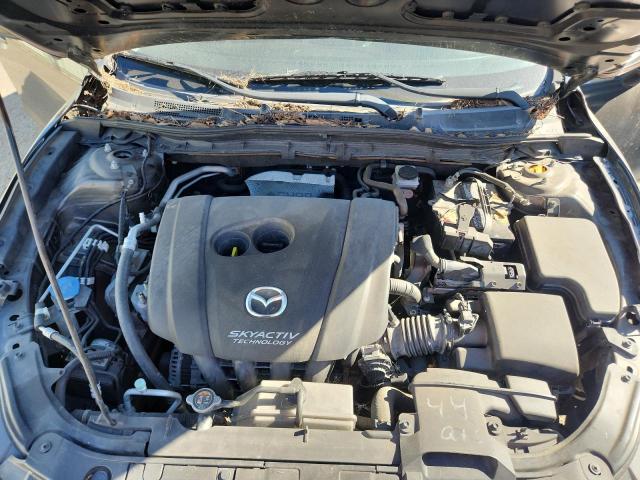 Photo 11 from auction – 2014 MAZDA 3 with VIN JM1BM1U71E1149139
