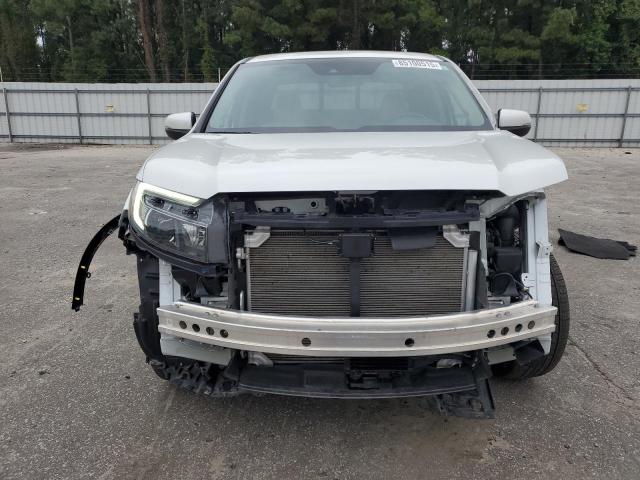 Photo 5 from auction – 2021 HONDA RIDGELINE with VIN 5FPYK3F76MB006581