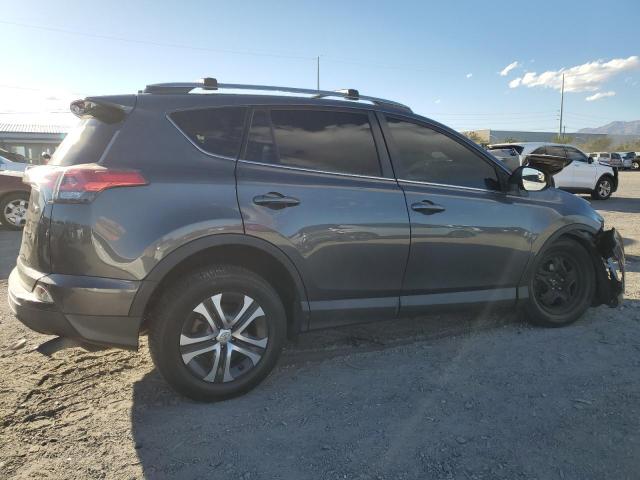 Photo 3 from auction – 2018 TOYOTA RAV4 LE with VIN 2T3ZFREV8JW452497