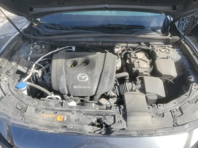 Photo 12 from auction – 2024 MAZDA CX-50 PREF with VIN 7MMVABBM4RN161272