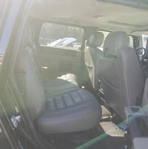 Photo 11 from auction – 2005 HUMMER H2 with VIN 5GRGN23UX5H111169
