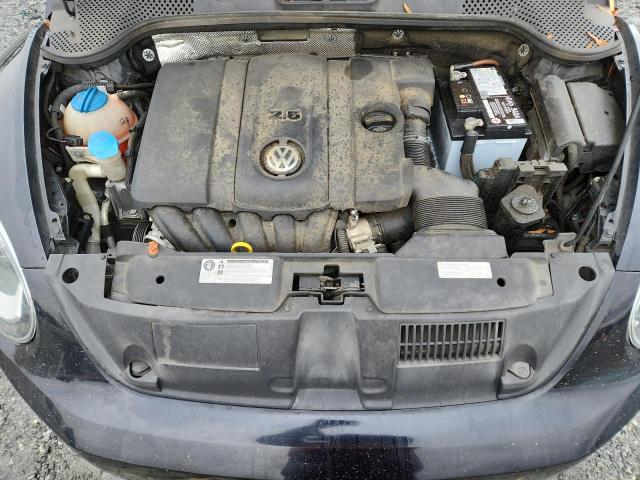 Photo 11 from auction – 2013 VOLKSWAGEN BEETLE with VIN 3VWJP7AT0DM689376