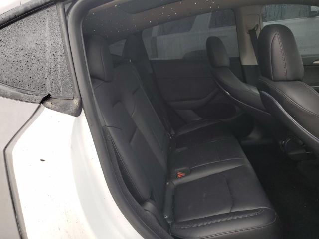 Photo 10 from auction – 2023 TESLA MODEL Y with VIN 7SAYGDEE7PF669228