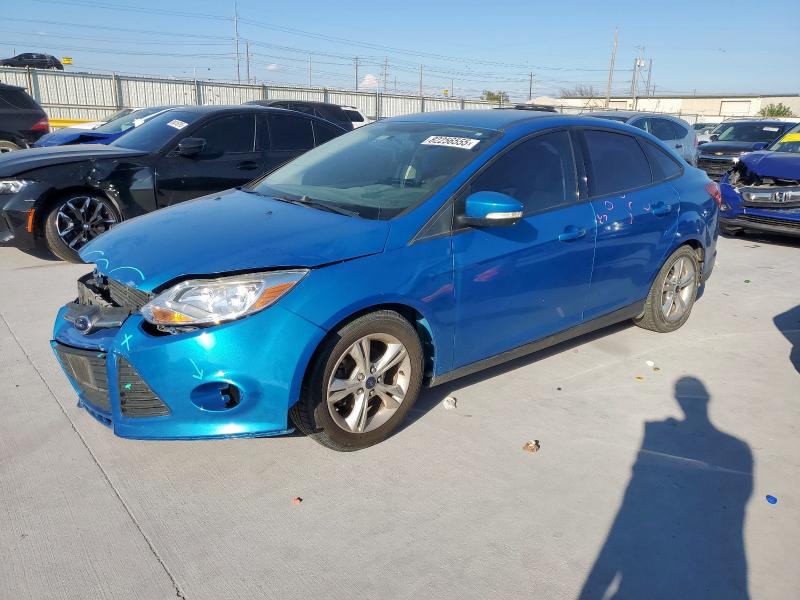 FORD FOCUS SE 2014 with VIN 1FADP3F23EL340763 - Photo from auction