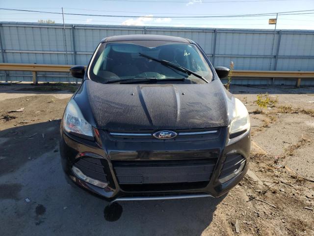 Photo 5 from auction – 2016 FORD ESCAPE SE with VIN 1FMCU0G73GUB04565