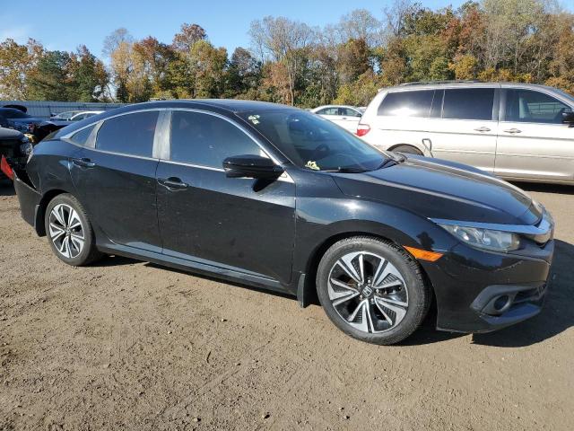 Photo 4 from auction – 2016 HONDA CIVIC EXL with VIN 19XFC1F72GE026662