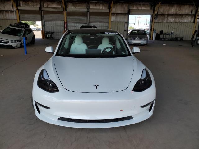 Photo 5 from auction – 2021 TESLA MODEL 3 with VIN 5YJ3E1EA6MF019083