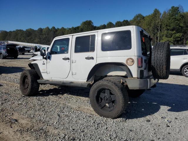 Photo 2 from auction – 2014 JEEP WRANGLER U with VIN 1C4BJWEG0EL128159