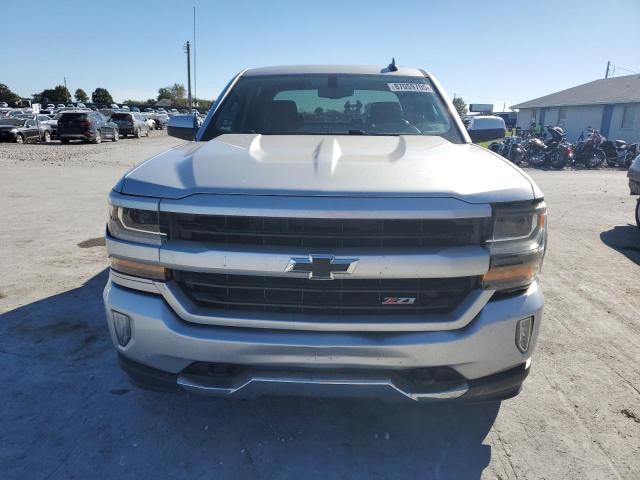 Photo 5 from auction – 2017 CHEVROLET SILVERADO with VIN 3GCUKREC7HG469452