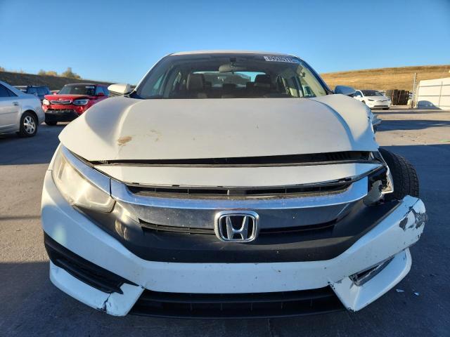 Photo 5 from auction – 2017 HONDA CIVIC EX with VIN 19XFC2F75HE047979