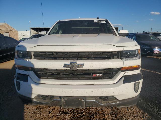 Photo 5 from auction – 2018 CHEVROLET SILVERADO with VIN 3GCUKREC5JG514345