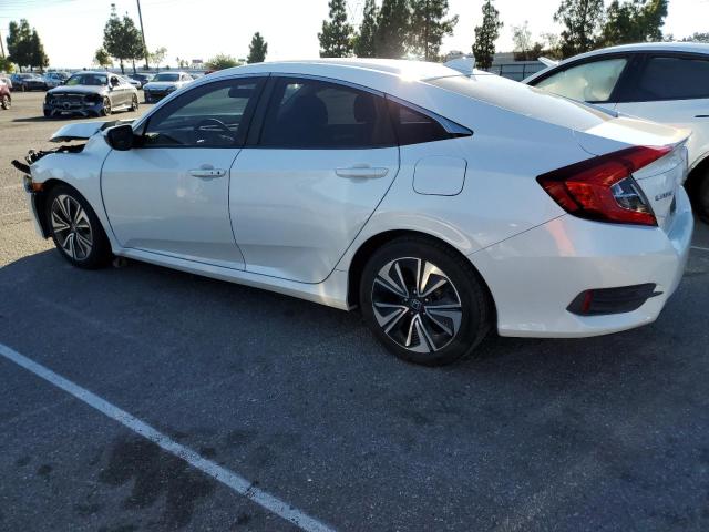 Photo 2 from auction – 2018 HONDA CIVIC EX with VIN JHMFC1F32JX033663