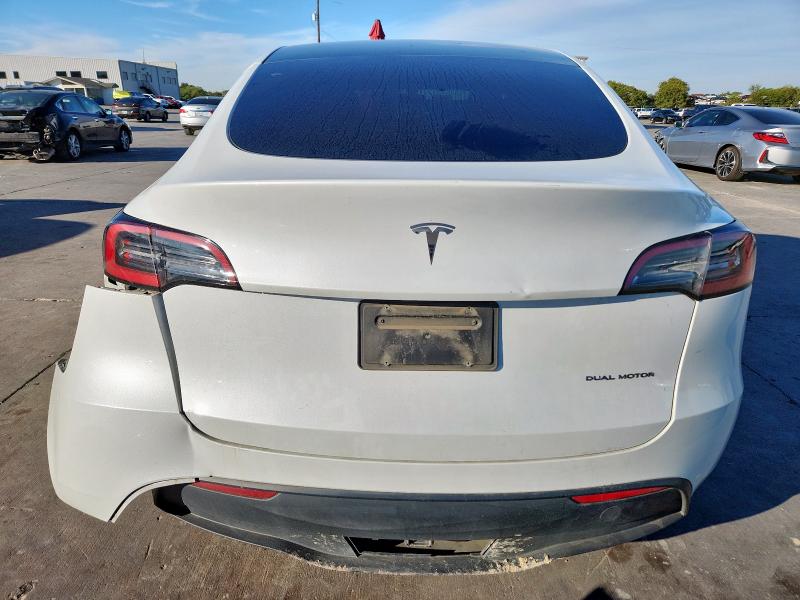 Photo 6 from auction – 2023 TESLA MODEL Y with VIN 7SAYGAEEXPF601116