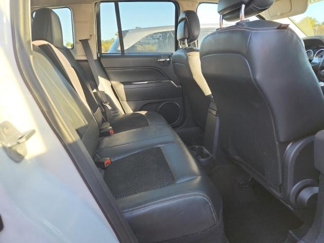 Photo 10 from auction – 2014 JEEP COMPASS LA with VIN 1C4NJDEB6ED904634
