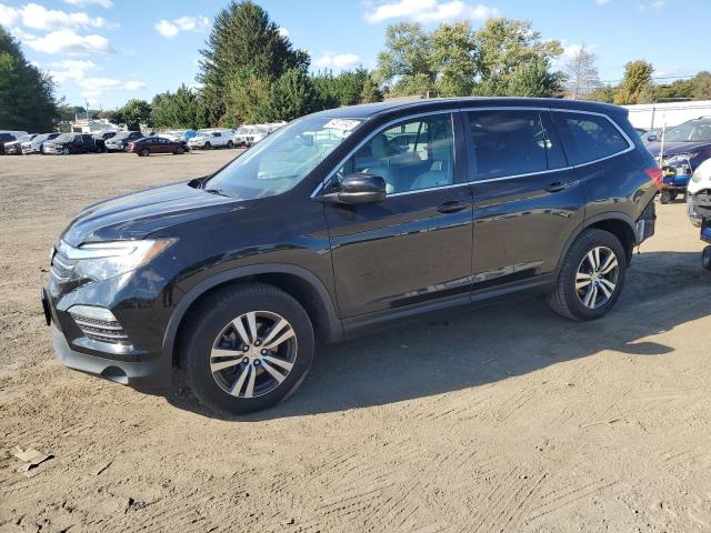 HONDA PILOT EXLN 2017 with VIN 5FNYF6H71HB093968 - Photo from auction