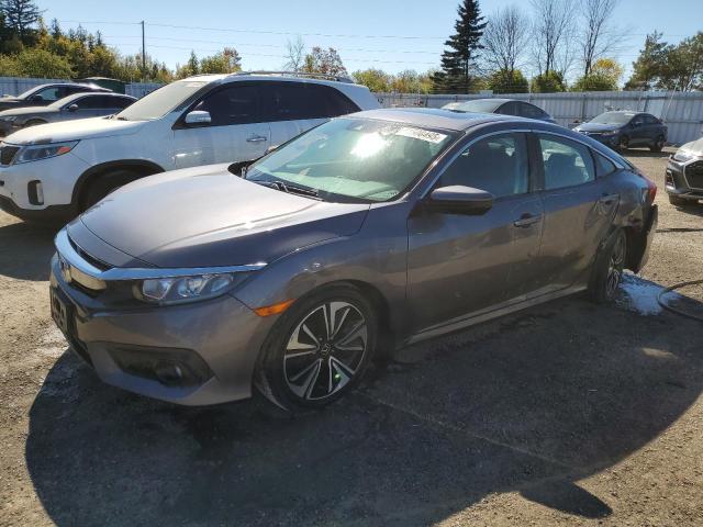 HONDA CIVIC EX 2016 with VIN 2HGFC1F40GH103394 - Photo from auction